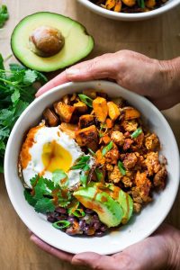 mexican breakfast bowl with sweet potato, black beans, egg or tofu
